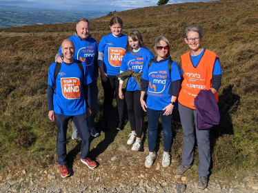 MS dons walking boots to help raise awareness of Motor Neurone Disease